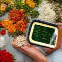 A balanced meal being prepared using fresh ingredients, viewed from above a digital tablet showing a recipe.